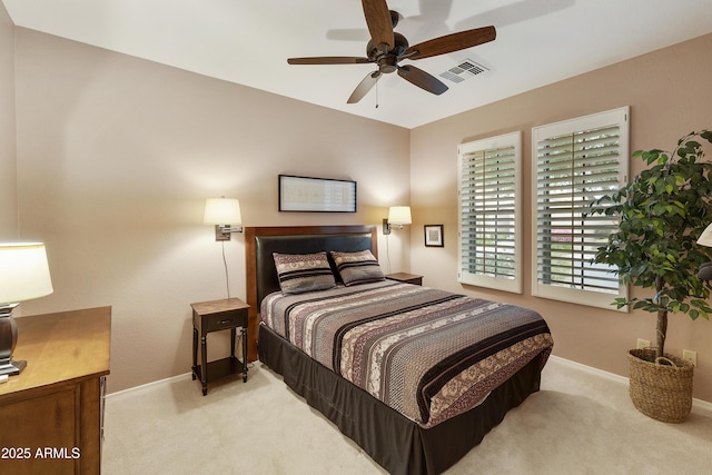 bedroom featuring ceiling fan and light colored carpet