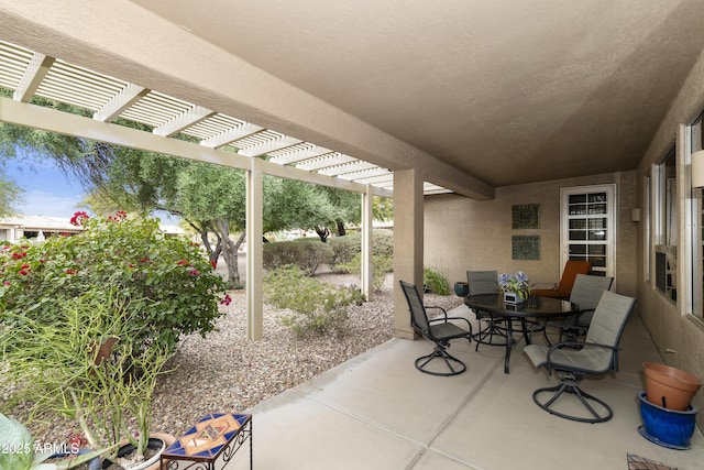 view of patio featuring a pergola