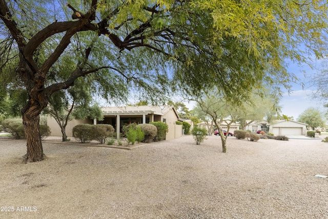 view of yard with a garage