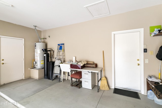 garage featuring water heater