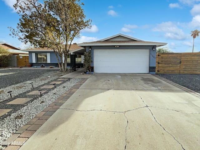 single story home featuring a garage