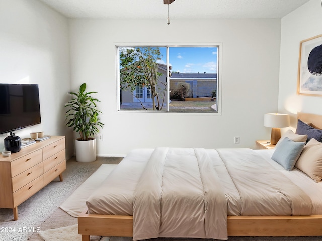 bedroom featuring multiple windows