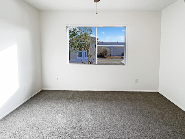 spare room featuring ceiling fan