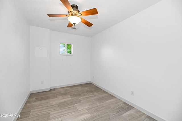 19401 W Flower St, Litchfield Park, AZ 85340 - spare room featuring a ceiling fan and baseboards