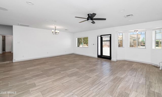 19401 W Flower St, Litchfield Park, AZ 85340 - spare room featuring a ceiling fan, a chandelier, baseboards, recessed lighting, and light wood-style flooring