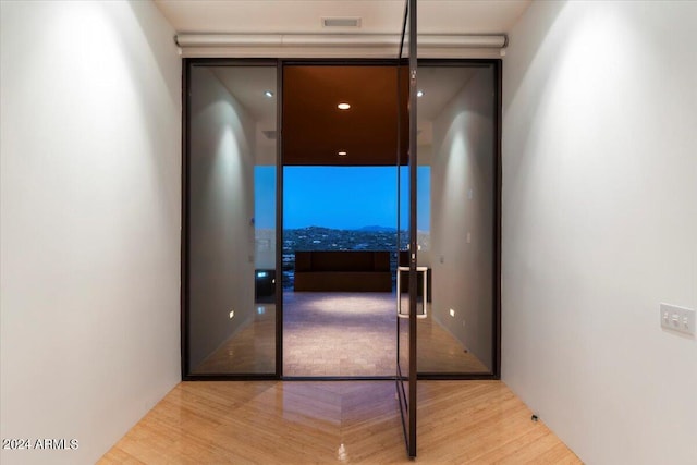 hallway featuring light hardwood / wood-style floors