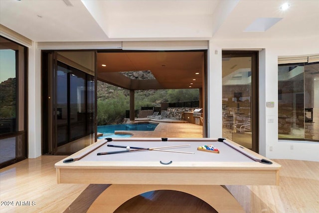 game room featuring light wood-type flooring and pool table