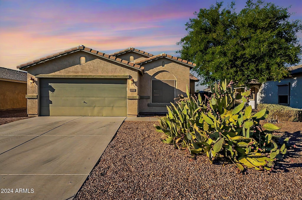 view of front of home with a garage