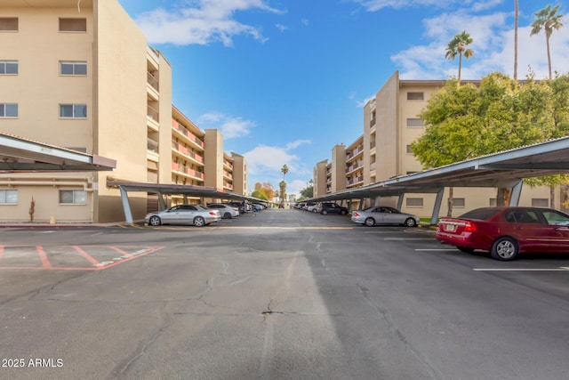 view of parking with a carport