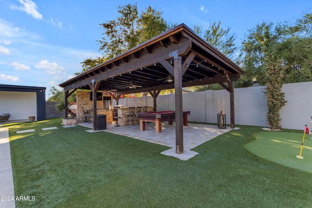 exterior space featuring exterior bar and a gazebo