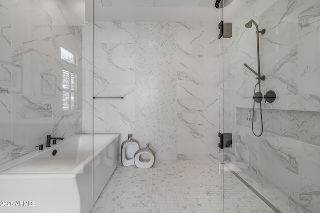 bathroom featuring separate shower and tub