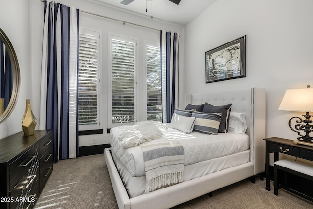 bedroom with ceiling fan and carpet