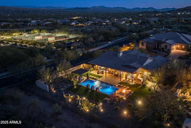 drone / aerial view featuring a mountain view