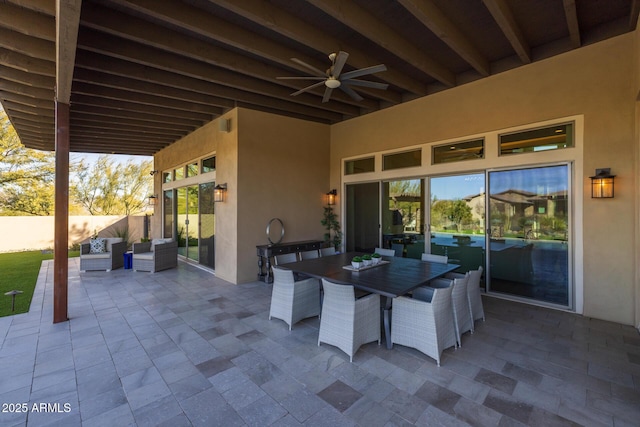 view of patio with ceiling fan