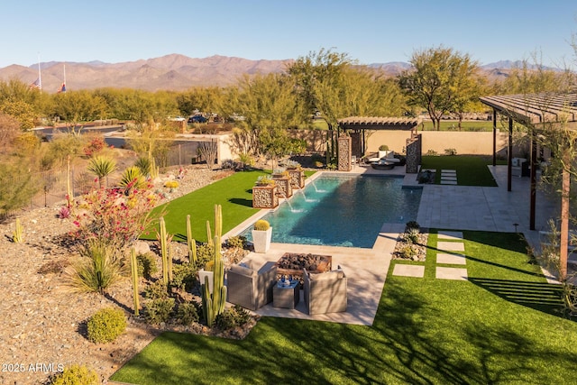 view of pool featuring a patio, a fire pit, a lawn, a pergola, and a mountain view