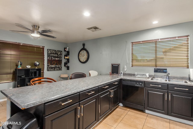 kitchen with light tile patterned floors, sink, black dishwasher, kitchen peninsula, and ceiling fan