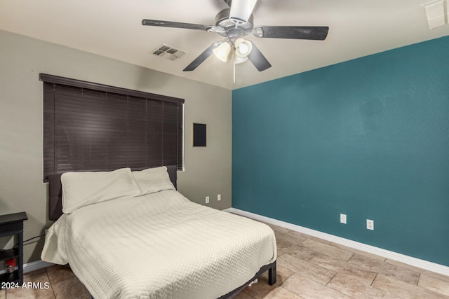 bedroom featuring ceiling fan