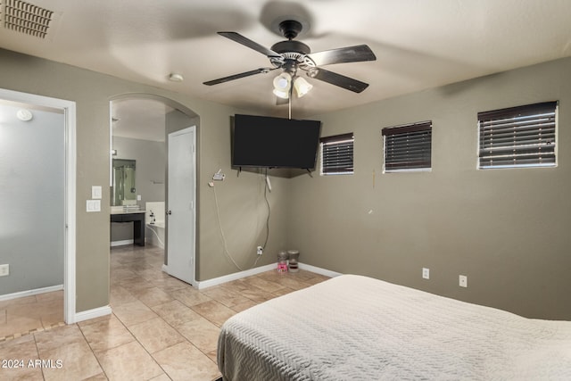 bedroom featuring ceiling fan and light tile patterned floors