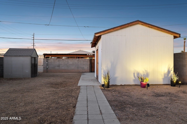 exterior space featuring a storage shed