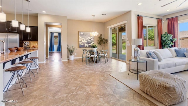 6917 E Ingram Cir, Mesa, AZ 85207 - living area with baseboards and recessed lighting
