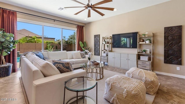 6917 E Ingram Cir, Mesa, AZ 85207 - living area with ceiling fan, light tile patterned floors, and recessed lighting