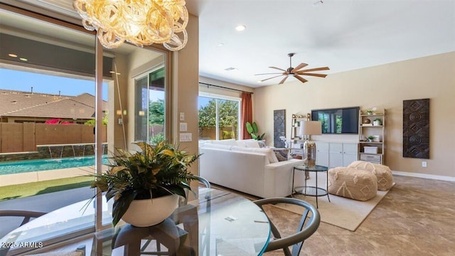 6917 E Ingram Cir, Mesa, AZ 85207 - living room featuring a chandelier, a ceiling fan, and recessed lighting