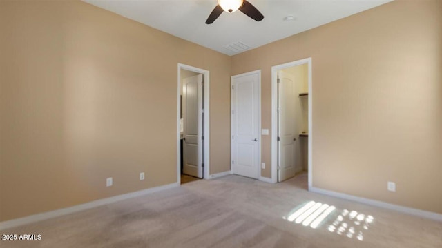 6917 E Ingram Cir, Mesa, AZ 85207 - unfurnished bedroom featuring carpet floors, a spacious closet, ceiling fan, and a closet