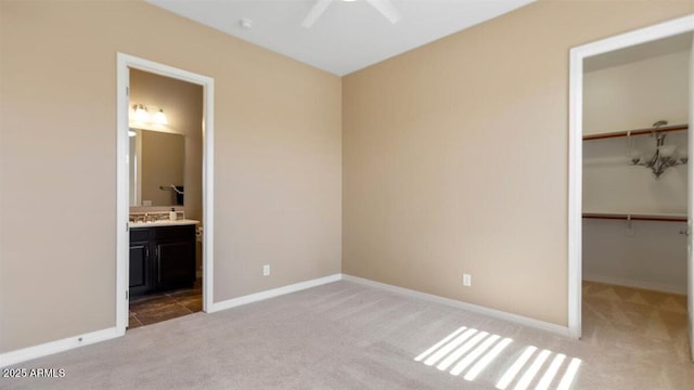 6917 E Ingram Cir, Mesa, AZ 85207 - unfurnished bedroom featuring carpet flooring, a spacious closet, a closet, and ensuite bath