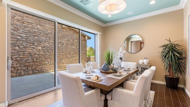 6917 E Ingram Cir, Mesa, AZ 85207 - dining room featuring wood finished floors, crown molding, and recessed lighting