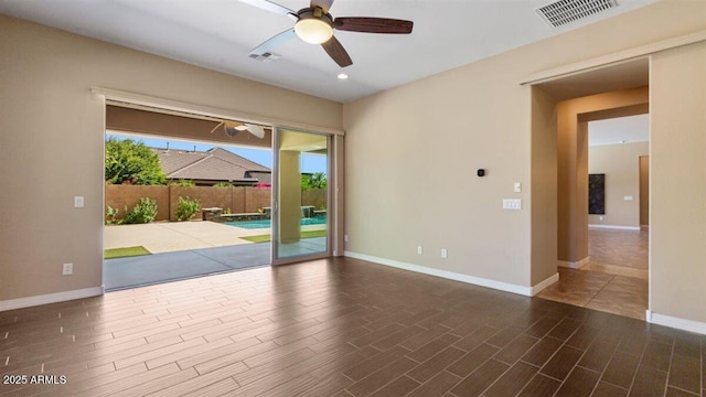 6917 E Ingram Cir, Mesa, AZ 85207 - empty room featuring ceiling fan, wood finished floors, and recessed lighting
