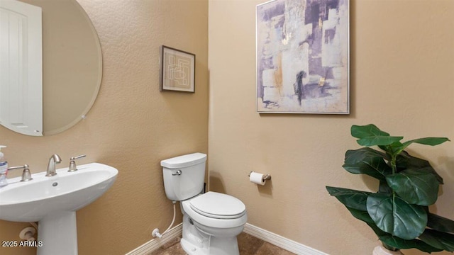 6917 E Ingram Cir, Mesa, AZ 85207 - half bath with toilet and baseboards