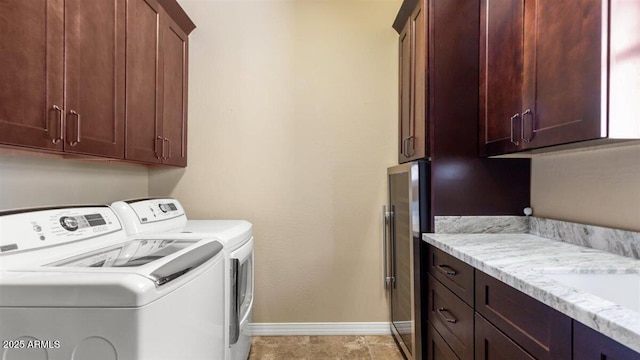 6917 E Ingram Cir, Mesa, AZ 85207 - washroom with cabinet space and separate washer and dryer