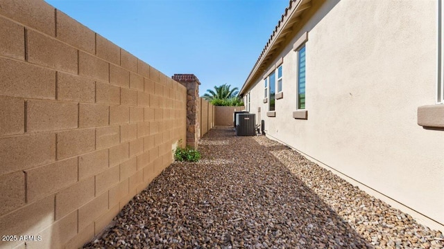 6917 E Ingram Cir, Mesa, AZ 85207 - view of home's exterior with a fenced backyard and stucco siding
