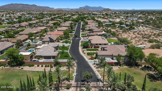 6917 E Ingram Cir, Mesa, AZ 85207 - aerial view of property's location with nearby suburban area and a mountainous background