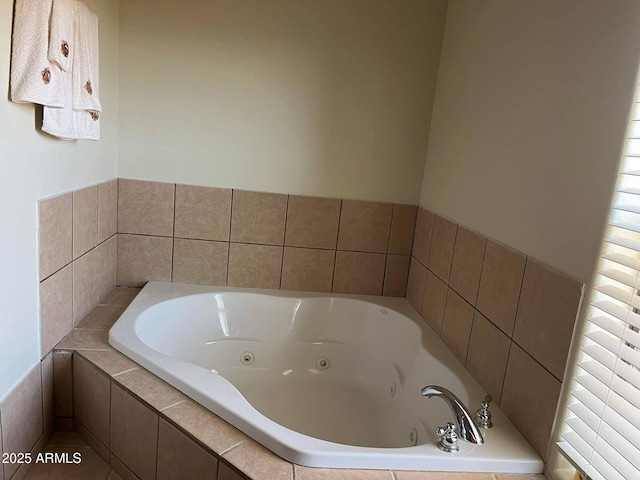 bathroom featuring a jetted tub