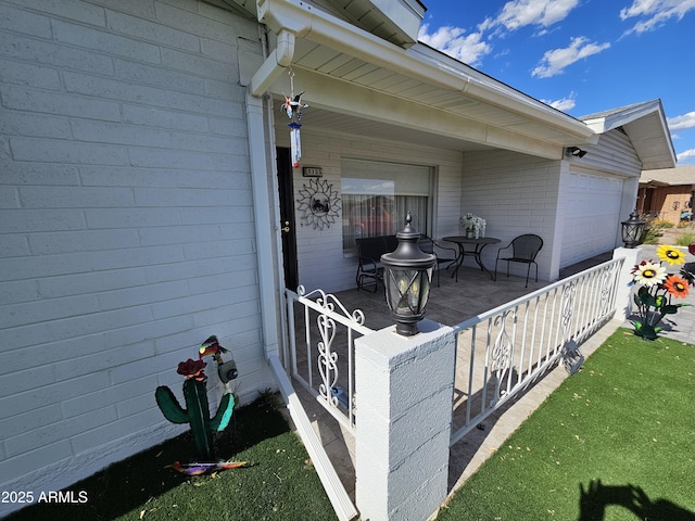 view of patio / terrace featuring an attached garage