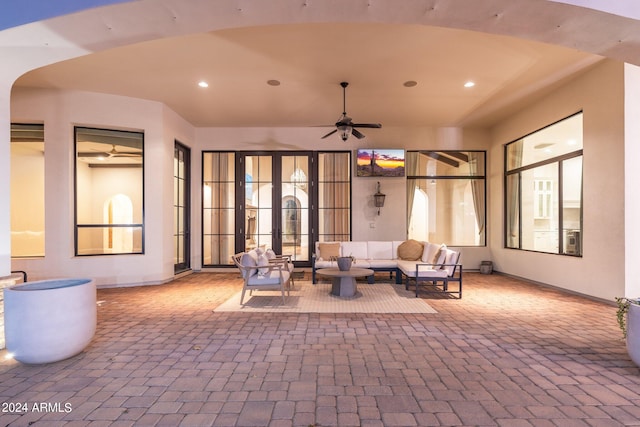 view of patio with outdoor lounge area and ceiling fan