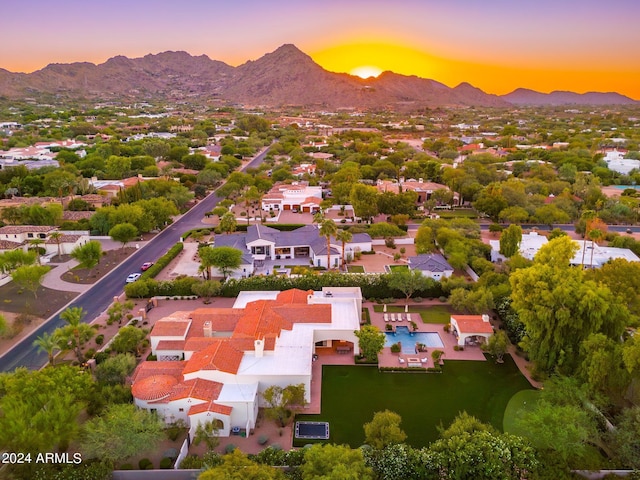 aerial view at dusk with a mountain view