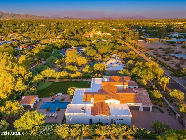 aerial view at dusk with a mountain view