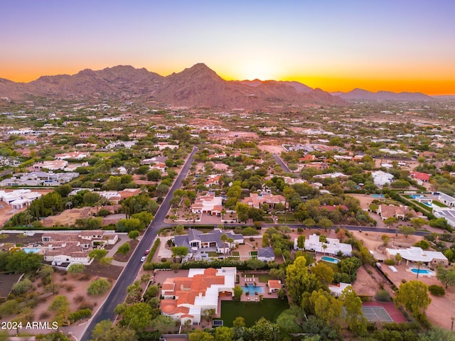 aerial view at dusk with a mountain view