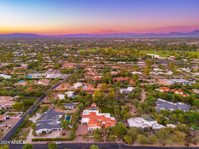 aerial view at dusk with a mountain view