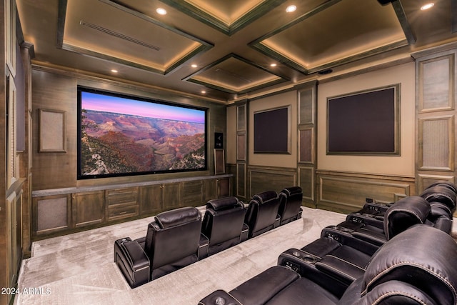 carpeted home theater room with beamed ceiling and coffered ceiling