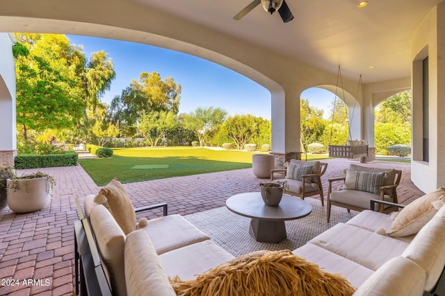 view of patio / terrace featuring outdoor lounge area and ceiling fan