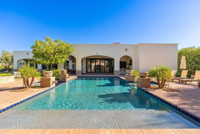 view of pool featuring a patio area