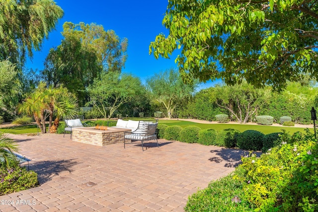 view of patio featuring a fire pit