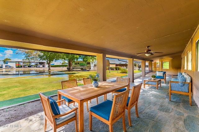 view of patio featuring an outdoor hangout area and ceiling fan