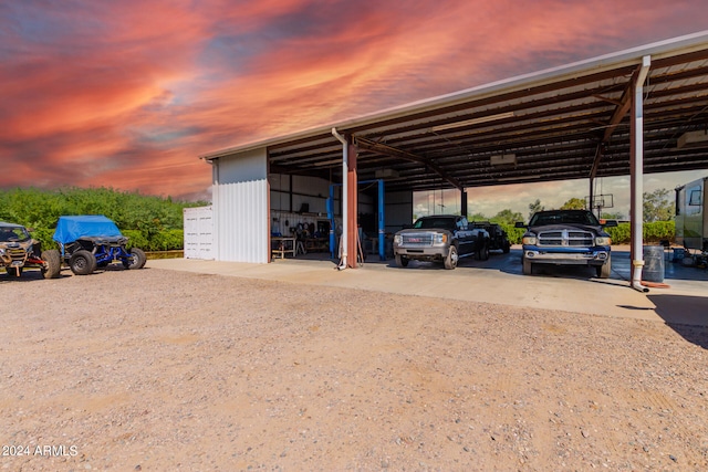 view of parking at dusk