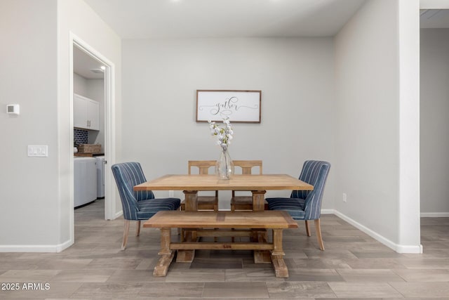 3081 E Desert Broom Pl, Chandler, AZ 85286 - dining space featuring baseboards and light wood-style flooring