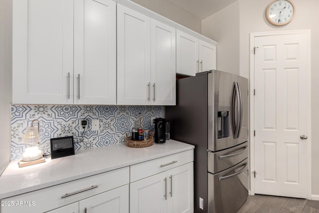 3081 E Desert Broom Pl, Chandler, AZ 85286 - kitchen featuring stainless steel refrigerator with ice dispenser, backsplash, and white cabinets