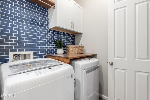 3081 E Desert Broom Pl, Chandler, AZ 85286 - laundry room with washing machine and dryer and cabinet space